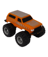 Orange Ford Bigfoot Truck McDonald&#39;s Happy Meal Toy - $187.97 MXN