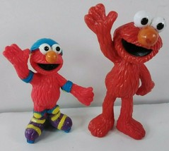 Sesame Street Jim Henson Elmo Figures: RDYF Waving Elmo, Roller Skates Elmo - £5.51 GBP