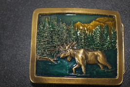 Moose in forest belt buckle- NEW - $284.59 MXN