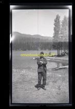 black and white negative - lake in the woods * snapshot man posing - $8.00