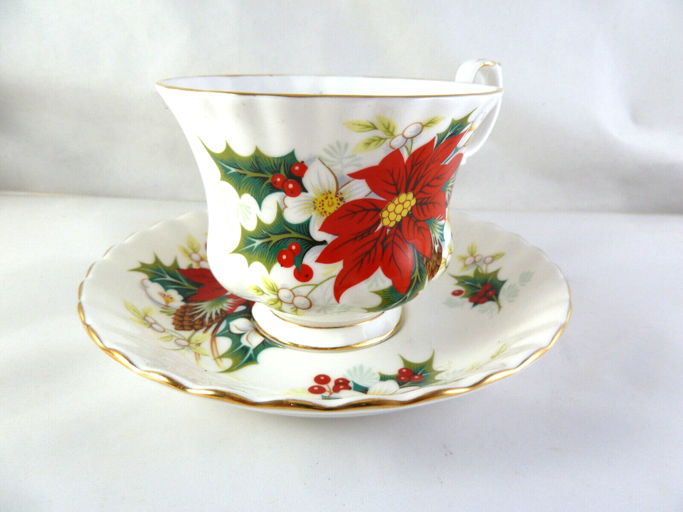 Royal Albert Bone China Poinsetta Christmas Tea Cup &amp; Saucer England &#39;76... - $28.95