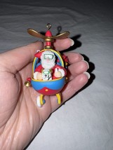 National Rennoc Christmas Tree Ornament Santa In Helicopter With Dog 199... - $8.79