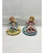 2 VINTAGE GIRL AND BOY CERAMIC FIGURINES Waking up to alarm - $19.75