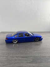 JADA 1/24 DUB CITY SLAMMED SILVER 1996 CHEVY IMPALA SS NEW - $335.71 MXN