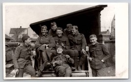 Military RPPC Group Of Soldiers In Uniform Having Fun Many Smiles Postcard N30 - £11.18 GBP