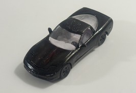 Racing Champions Black 1997 Chevy Corvette Made in China - $2.19