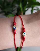 Red string bracelet with Hand of Fatima / Pulsera hilo rojo con mano de ... - $149.96 MXN