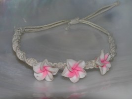 Gently Used Cream Crocheted Twist with Pink &amp; White Clay Plumeria Flower Brace - £6.86 GBP