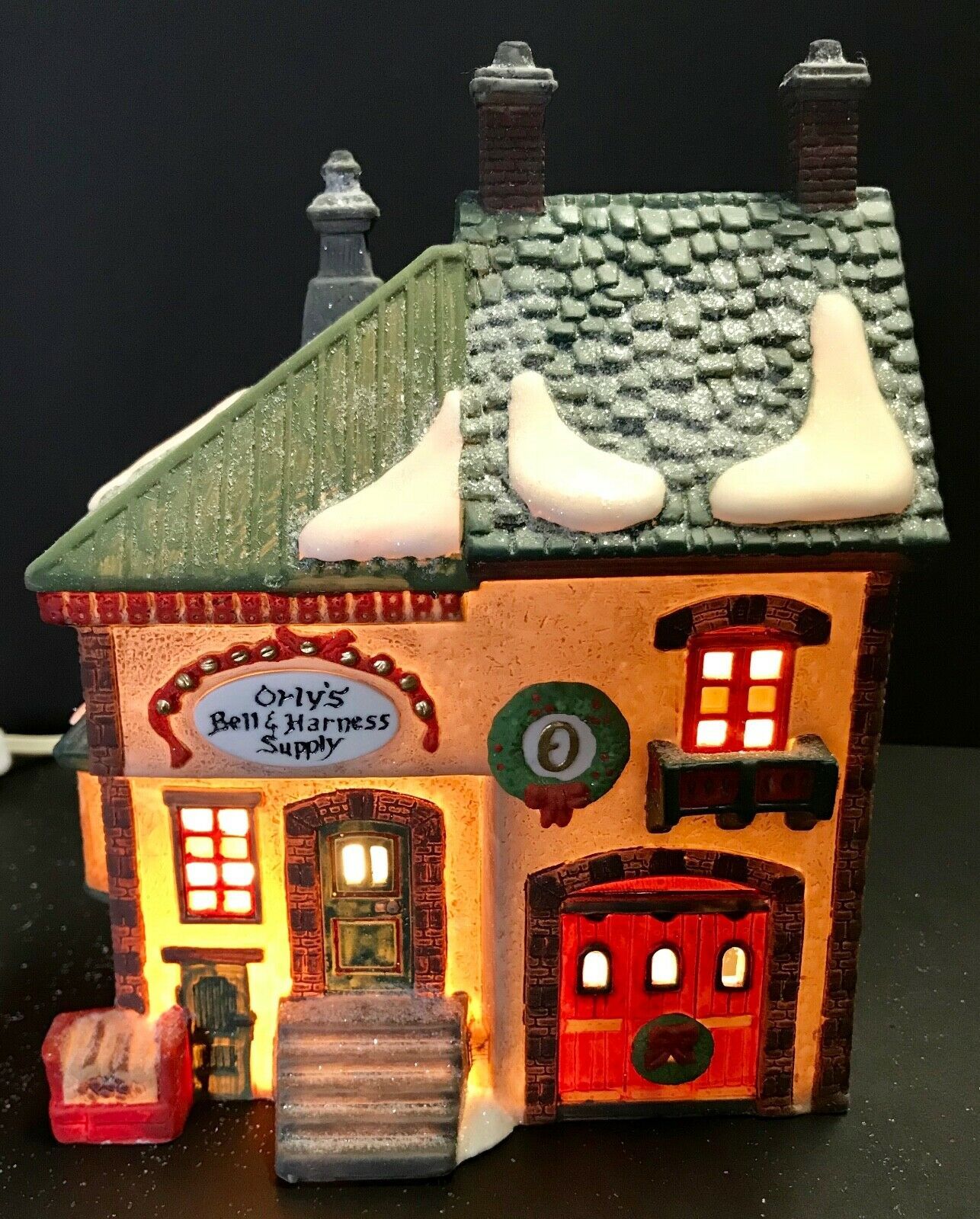 Dept 56 North Pole Series #56219 ORLY'S BELL & HARNESS SUPPLY Lighted Building - $34.94