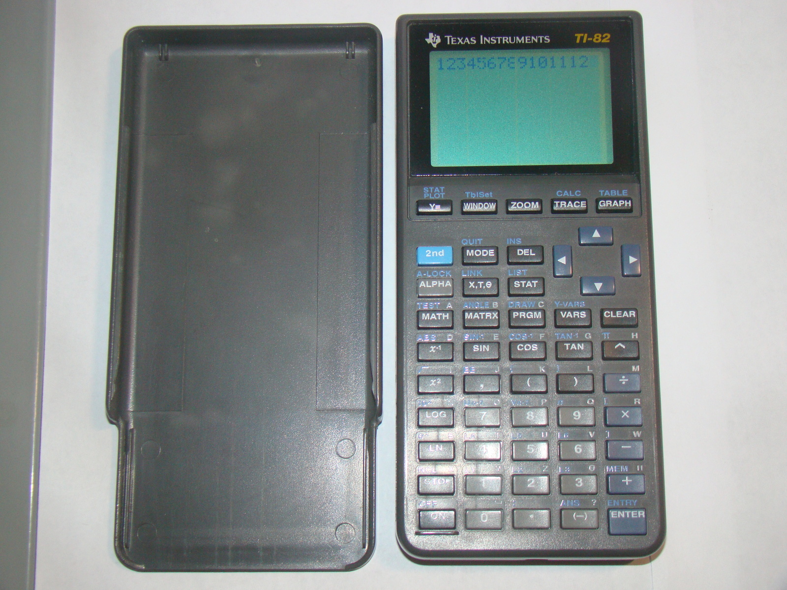 Primary image for TEXAS INSTRUMENTS - TI-82 Graphing Calculator