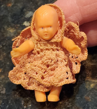 Vintage 1950s Celluloid Baby Doll Miniature In Hand Crocheted Dress Broo... - $12.99