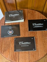 2010 CADILLAC SRX OWNERS MANUAL SET WITH NAVIGATION BOOK - $252.89 MXN