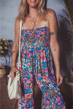 Aruba Blue Plain Racerback Pocketed Sleeveless Romper - $251.43 MXN