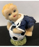 Ceramic Toddler / Baby playing on a Soccer Ball 2.5&quot; tall - £15.00 GBP