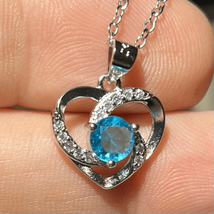 AXZ Silver 925 Silver Heart with ice blue Zircon Gem - £51.43 GBP