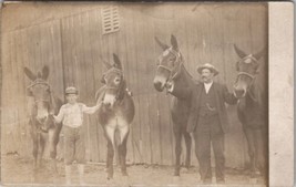 RPPC Man with Young Boy Showing off their Mules at Barn c1909 Photo Postcard Z24 - £9.55 GBP