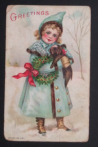 Christmas Greetings Girl in Blue Holding Puppy &amp; Wreath Textured Postcard 1909 - $9.99