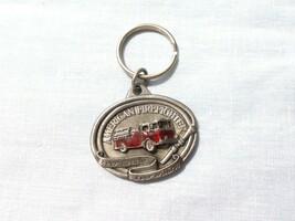 FIREFIGHTER Ever Ready Ever Willing PEWTER ENAMEL FIRE TRUCK KEY RING SI... - $183.56 MXN