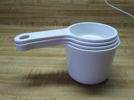 White plastic measuring cup set - £7.58 GBP
