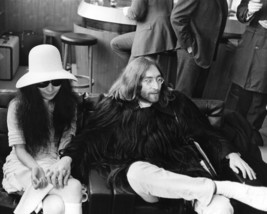 John Lennon with wife Yoko Ono 1969 Paris coat made of human hair 16x20 Poster - £15.71 GBP