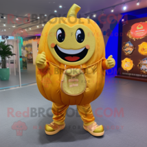 Gold Pumpkin mascot costume character dressed with a Jeans and Coin purses - £960.69 GBP