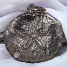 Vintage Sand Dollar Charm - $285.54 MXN