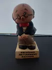 Vintage Enesco &quot;Swinging Retirement Savings&quot; Ceramic Penny/Coin Bank - $21.93 CAD