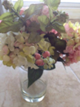 multicolored silk floral arrangement attached within the glass of the vaseo - $29.99