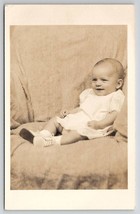 RPPC Little Baby Propped Up For Photo Sweet Smile Postcard Q24 - £3.94 GBP
