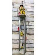 In Line of Duty Yellow Suit Fireman By Red Fire Hydrant Wind Chime Garde... - $45.09 CAD