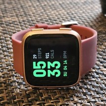 Fitbit Versa Smartwatch Tracker Rose Red. No Heart Rate. No Charger. For Parts. - $16.00