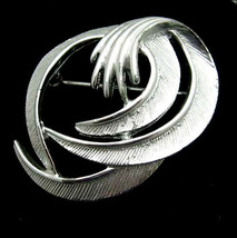 Sarah Coventry SWIRL CURL SPIRAL FLAIR BROOCH Vintage PIN Silvertone Ribbon - $18.80