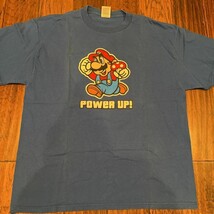 Mario Mens Delta Graphic T-Shirt Blue Power Up Crew Neck Short Sleeve Tee L - $27.43 CAD