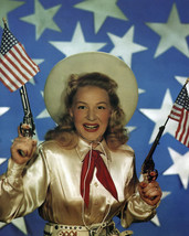 Betty Hutton in Annie Get Your Gun classic pose with American flag and g... - £55.04 GBP