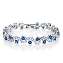 Cubic Zirconia &amp; Blue Crystal Prong Crossing Line Tennis Bracelet - £14.42 GBP