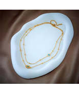 Double necklace with Turkish evil eye pendant. / Collar doble con dije d... - $15.00