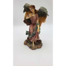 8in Resin Angel with Flower Bouquet Figurine - $20.00