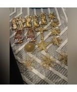Lot of 17 gold ornaments - $230.93 MXN