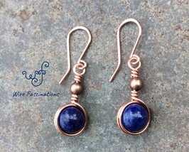 Handmade lapis lazuli earrings: copper wire wrapped in a simple circular design - £18.85 GBP
