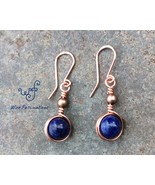 Handmade lapis lazuli earrings: copper wire wrapped in a simple circular... - $447.74 MXN