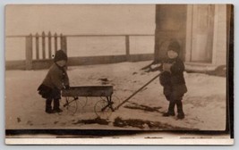 RPPC Cute Children With Wagon in Snow Hats Gloves Coats Postcard E29 - £7.15 GBP