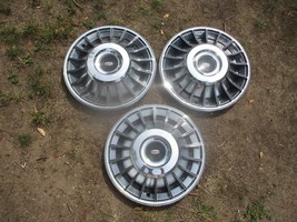 Genuine 1971 to 1973 Mercury Montego Cougar deluxe 14 inch hubcap wheel covers - $60.43