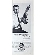 Monroe Shocks Tail Dragging Sam Hanks Holding Shock Load -1965 Vintage P... - $7.85