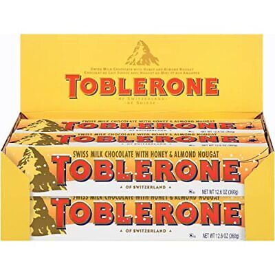 Primary image for Toblerone Swiss Milk Chocolate with Honey Almond Nougat Holiday Chocolate 12....