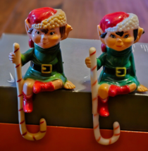 Lot 2 Vtg Plastic Christmas Stocking Holder Pixie Elf Hangers 1 Blk Hair &amp; 1 Brn - £10.07 GBP