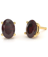 Garnet 7x5mm Oval Stud Earrings in 14k Yellow Gold - $5,092.37 MXN