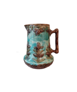 Jug in slag with fir apple decoration, 19th century - $187.92 CAD