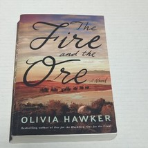 The Fire and the Ore: A Novel Paperback– 2022 by Olivia Hawker - £5.47 GBP