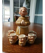 LEFTON 8 INCH MONK DECANTER AND 5 MINI MUGS 2 INCH - $26.62