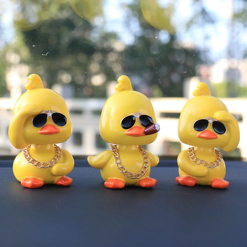 Tiktok yellow duck car interior ornament cute car shaking head doll car - £13.05 GBP